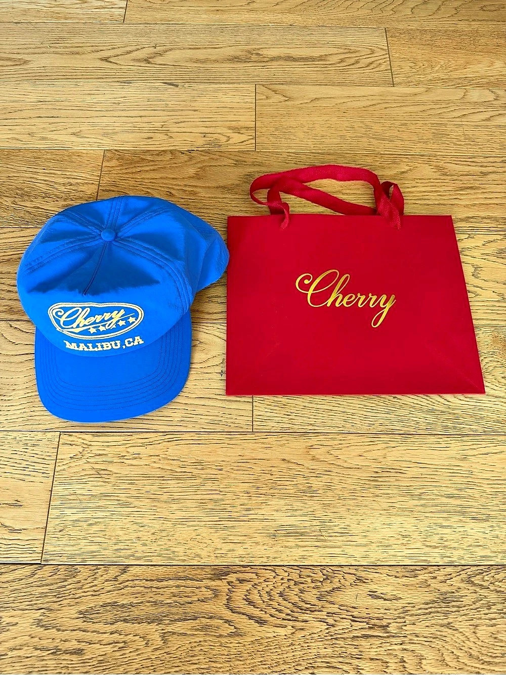 Cherry LA Malibu Five Star Blue Embroidered Trucker Hat SnapBack